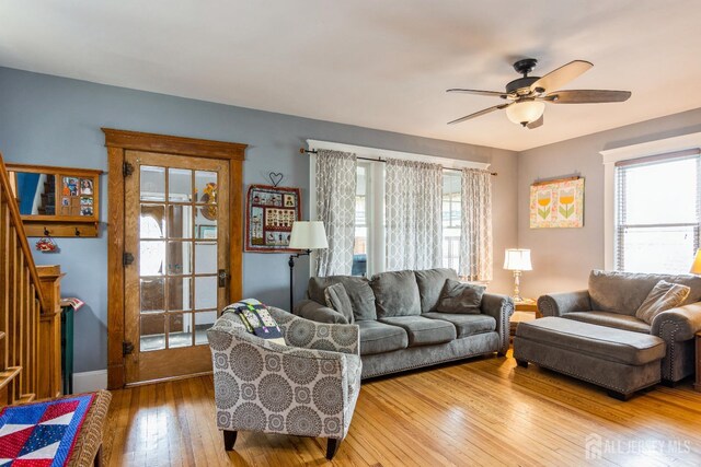 177 Hillside Ave, South River, NJ 08882 - living room featuring hardwood / wood-style flooring, ceiling fan, stairway, and baseboards