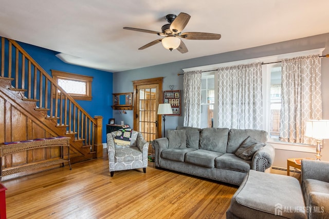 177 Hillside Ave, South River, NJ 08882 - living room featuring stairway, healthy amount of natural light, a ceiling fan, and wood-type flooring