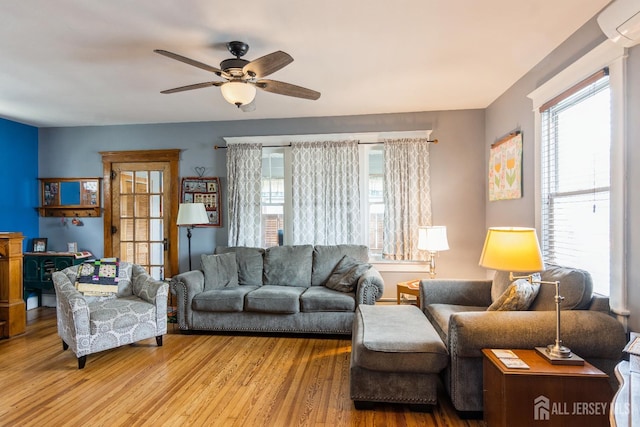 177 Hillside Ave, South River, NJ 08882 - living area featuring wood finished floors, healthy amount of natural light, and ceiling fan
