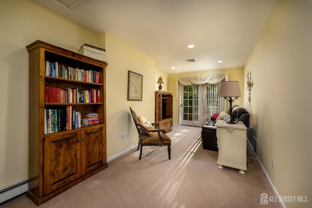 sitting room featuring carpet, baseboards, baseboard heating, and recessed lighting