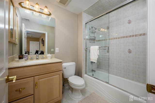 full bath featuring visible vents, vanity, toilet, and tile patterned floors