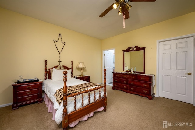 bedroom with carpet and a ceiling fan