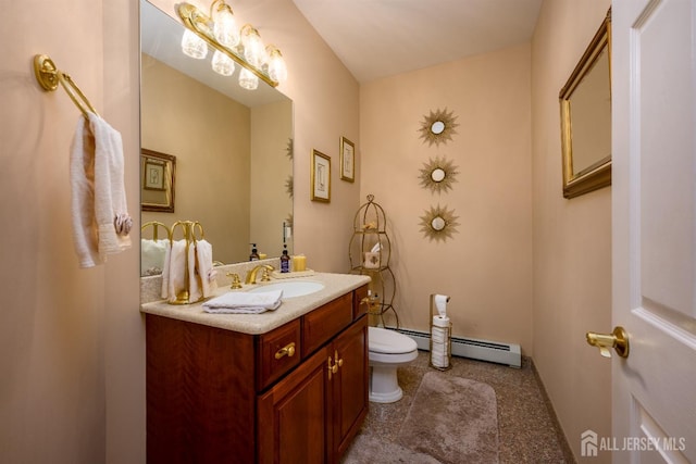 bathroom with toilet, a baseboard radiator, and vanity