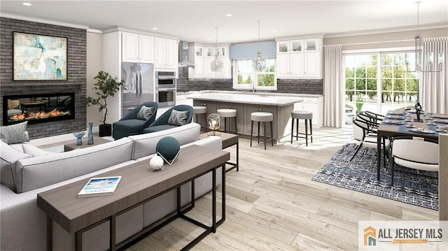 19 Kearns Pl Unit 3905, South Brunswick, NJ 08852 - living area featuring light wood-style flooring, recessed lighting, crown molding, and a brick fireplace