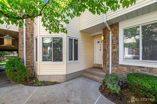 1103 Schmidt Ln, North Brunswick, NJ 08902 - property entrance featuring stone siding