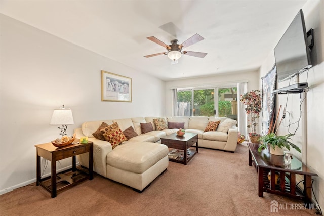 1103 Schmidt Ln, North Brunswick, NJ 08902 - living area with light carpet and a ceiling fan