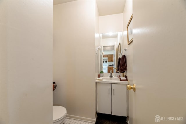 1103 Schmidt Ln, North Brunswick, NJ 08902 - bathroom with vanity and tile patterned flooring