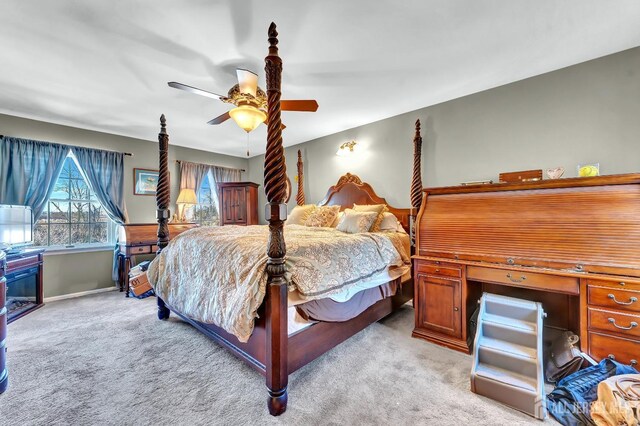 bedroom with light colored carpet and ceiling fan