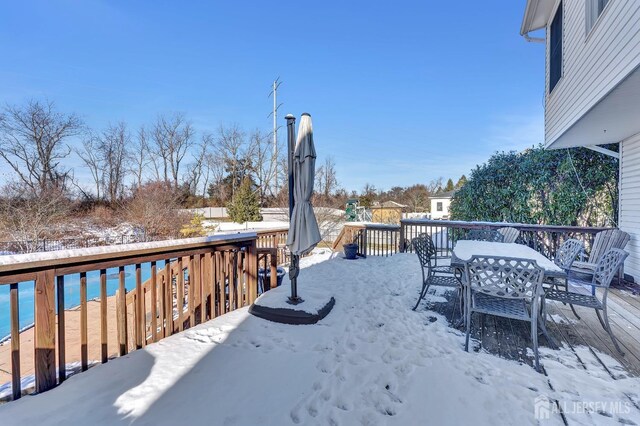 view of snow covered deck