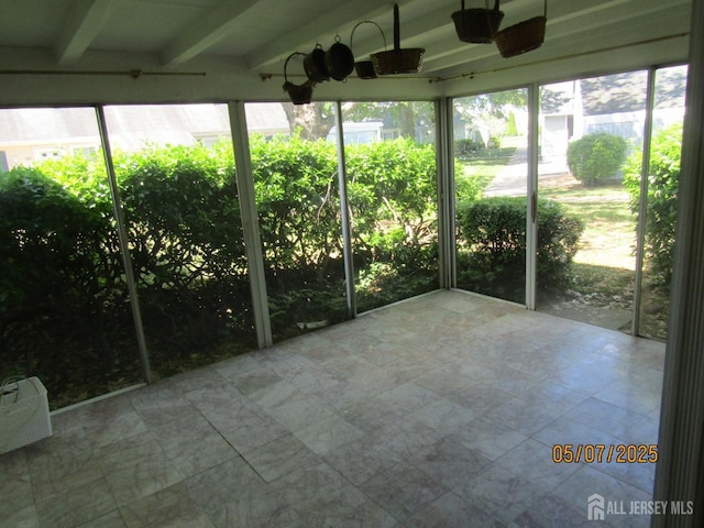 160 Pelham Ln Unit B, Monroe, NJ 08831 - unfurnished sunroom with beamed ceiling
