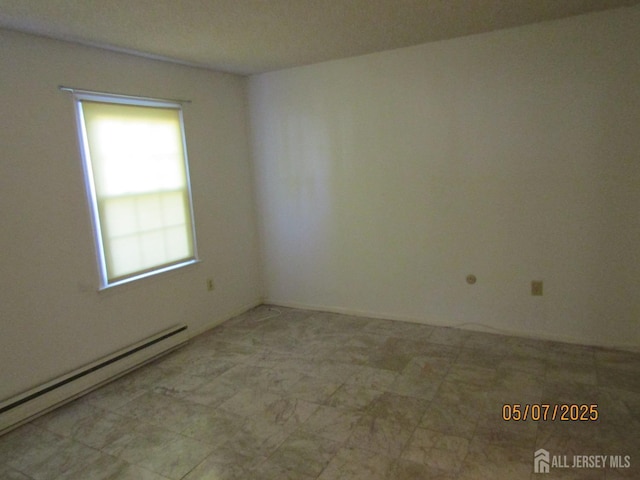 160 Pelham Ln Unit B, Monroe, NJ 08831 - empty room featuring a baseboard heating unit