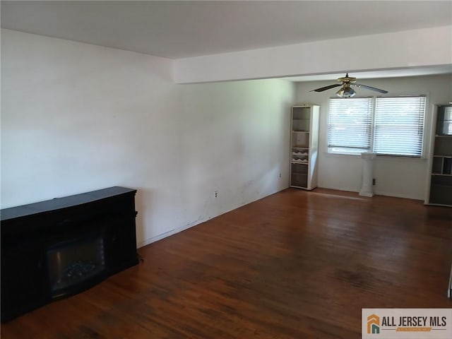 148 Dutton St, Franklin, NJ 08873 - unfurnished living room with ceiling fan and wood finished floors