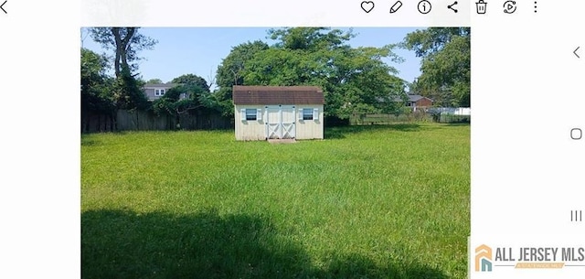 148 Dutton St, Franklin, NJ 08873 - view of yard with a storage unit