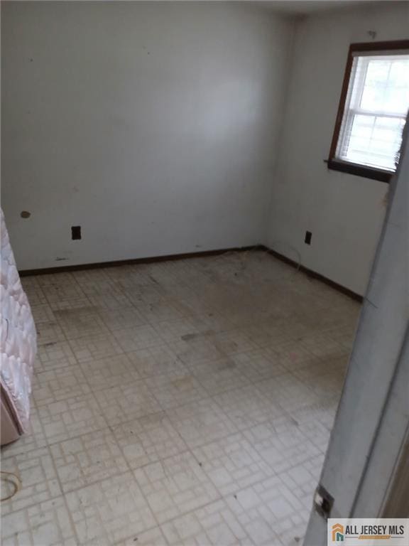 148 Dutton St, Franklin, NJ 08873 - empty room featuring baseboards