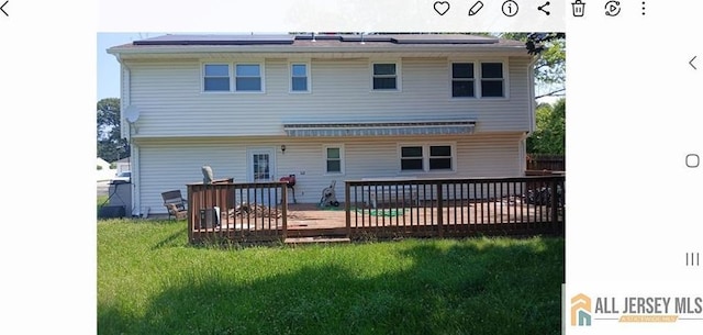 148 Dutton St, Franklin, NJ 08873 - rear view of property with a yard and a deck