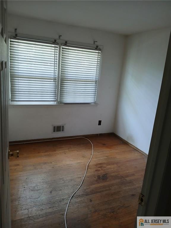 148 Dutton St, Franklin, NJ 08873 - unfurnished room featuring wood finished floors