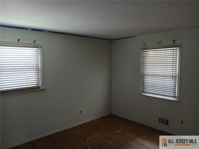 148 Dutton St, Franklin, NJ 08873 - empty room featuring wood finished floors