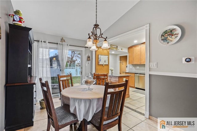 7 Piedmont Dr, Old Bridge, NJ 08857 - dining area with vaulted ceiling, light tile patterned floors, and a chandelier