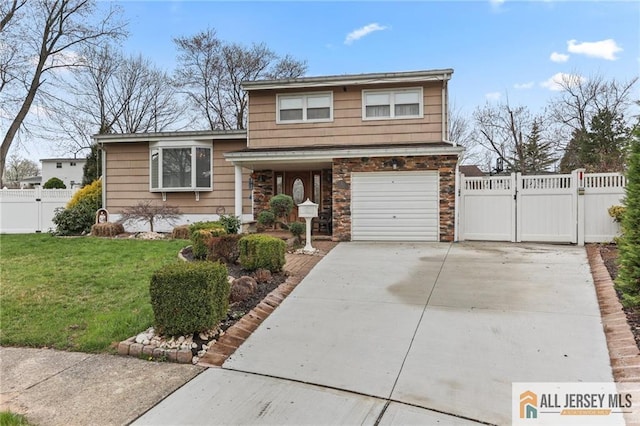 7 Piedmont Dr, Old Bridge, NJ 08857 - tri-level home featuring a gate, driveway, and an attached garage