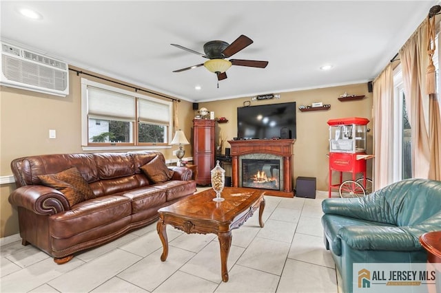 7 Piedmont Dr, Old Bridge, NJ 08857 - living area featuring plenty of natural light, a ceiling fan, an AC wall unit, a glass covered fireplace, and recessed lighting