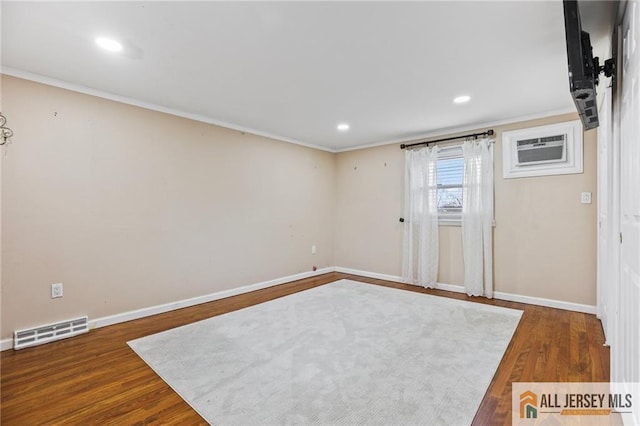 7 Piedmont Dr, Old Bridge, NJ 08857 - unfurnished room featuring wood finished floors, ornamental molding, recessed lighting, and a wall unit AC