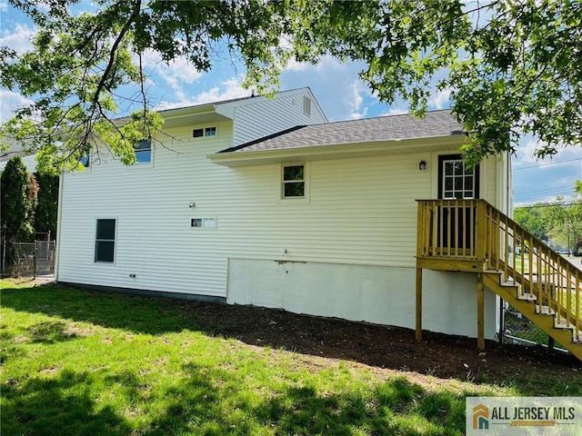 rear view of house with stairs