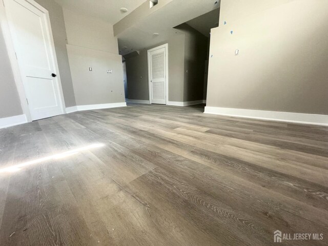 363 Ferris St, South Amboy, NJ 08879 - empty room featuring baseboards and wood finished floors