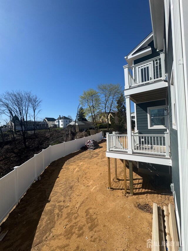 363 Ferris St, South Amboy, NJ 08879 - view of yard featuring a fenced backyard and a balcony