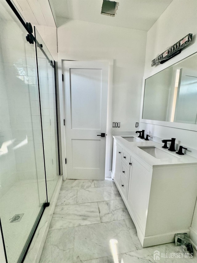 363 Ferris St, South Amboy, NJ 08879 - full bathroom featuring a sink, a shower stall, marble finish floor, and double vanity