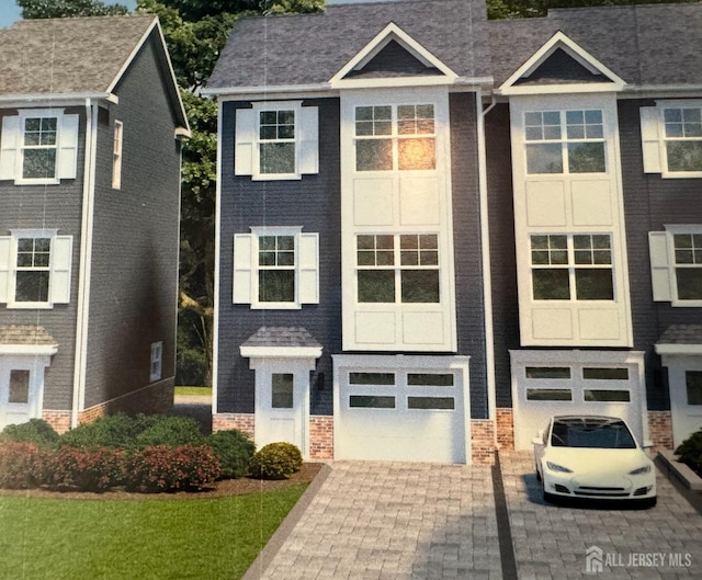 363 Ferris St, South Amboy, NJ 08879 - multi unit property with an attached garage and decorative driveway