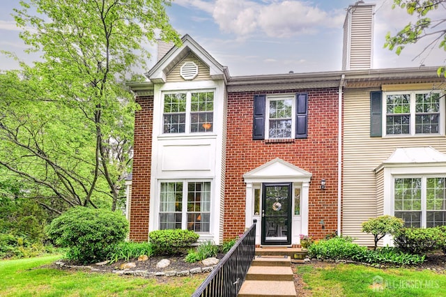 25 Sheffield Ct, North Brunswick, NJ 08902 - multi unit property featuring a chimney and brick siding