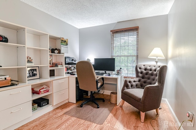25 Sheffield Ct, North Brunswick, NJ 08902 - office area with light wood-type flooring and a textured ceiling