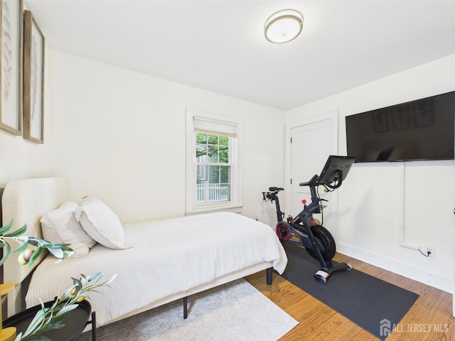218 Washington Ave, Matawan, NJ 07747 - bedroom with wood finished floors and baseboards