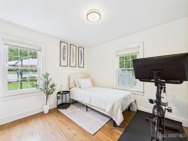 218 Washington Ave, Matawan, NJ 07747 - bedroom featuring wood finished floors and baseboards