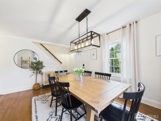 218 Washington Ave, Matawan, NJ 07747 - dining space featuring dark wood-style flooring, baseboards, and stairs