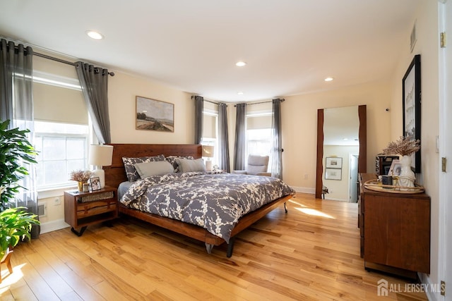 bedroom featuring light wood-type flooring