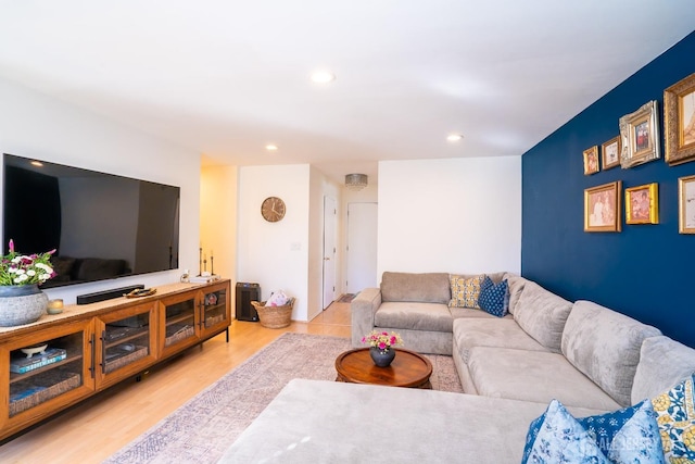 living room with light hardwood / wood-style flooring