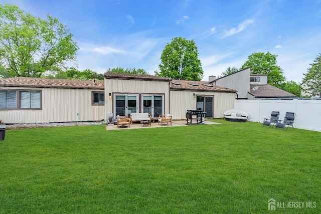 218 Community Cir, Old Bridge, NJ 08857 - back of property featuring an outdoor hangout area and a patio