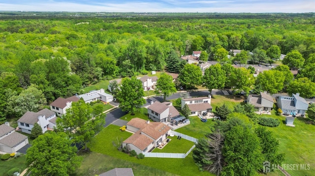 218 Community Cir, Old Bridge, NJ 08857 - aerial perspective of suburban area with a heavily wooded area