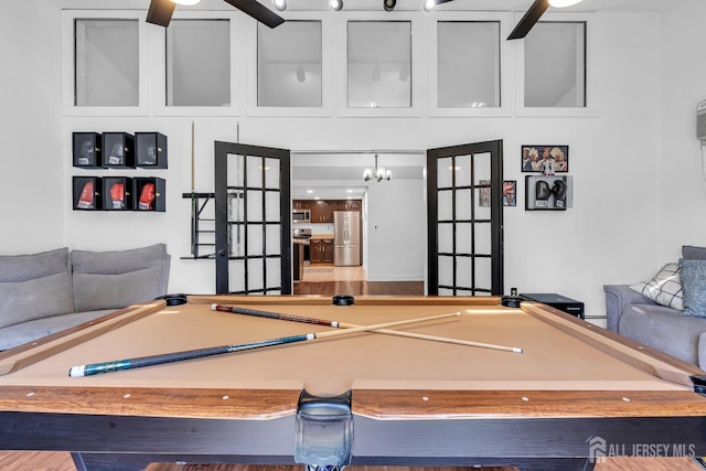 218 Community Cir, Old Bridge, NJ 08857 - rec room with pool table and a chandelier