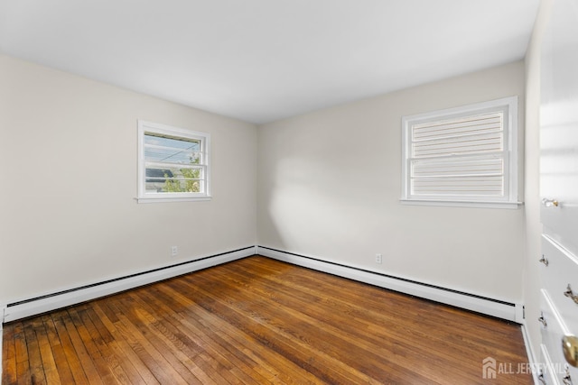 82 Mercer St, Menlo Park Terrace, NJ 08840 - spare room featuring a baseboard radiator and hardwood / wood-style flooring