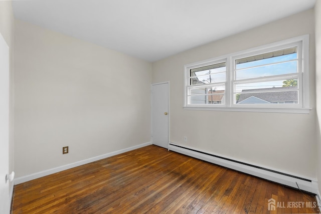 82 Mercer St, Menlo Park Terrace, NJ 08840 - empty room featuring baseboard heating and hardwood / wood-style flooring