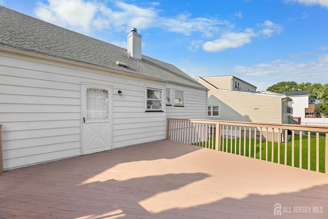 82 Mercer St, Menlo Park Terrace, NJ 08840 - wooden terrace featuring a lawn