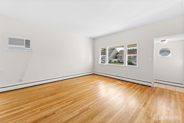 82 Mercer St, Menlo Park Terrace, NJ 08840 - unfurnished room with light wood-style flooring, a baseboard heating unit, and an AC wall unit