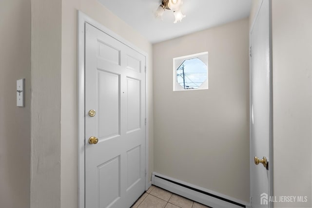82 Mercer St, Menlo Park Terrace, NJ 08840 - entryway featuring baseboard heating and light tile patterned floors