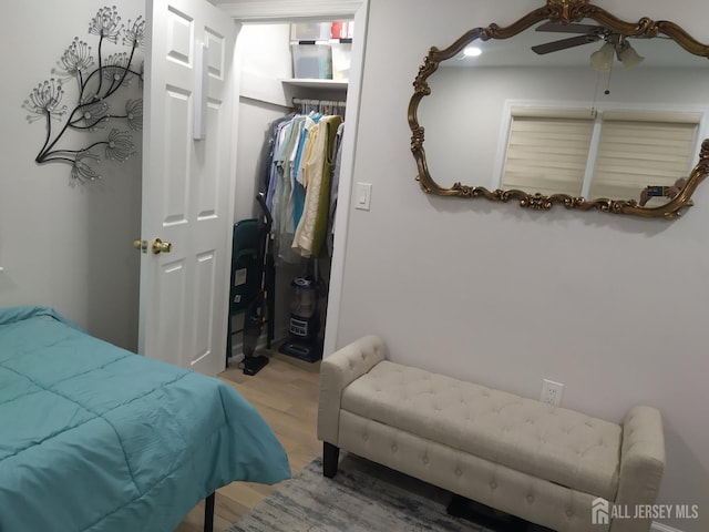 bedroom featuring a closet and wood finished floors