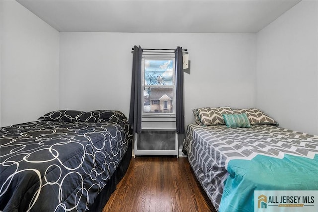 43 Livingston Ave, Avenel, NJ 07001 - bedroom featuring wood finished floors and baseboards