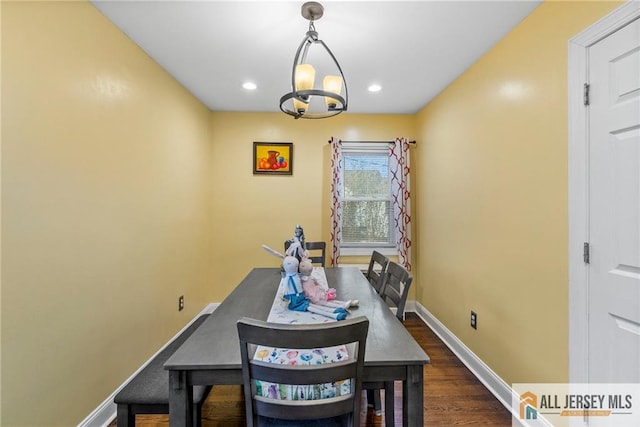 43 Livingston Ave, Avenel, NJ 07001 - dining area featuring baseboards, recessed lighting, an inviting chandelier, and dark wood-style flooring