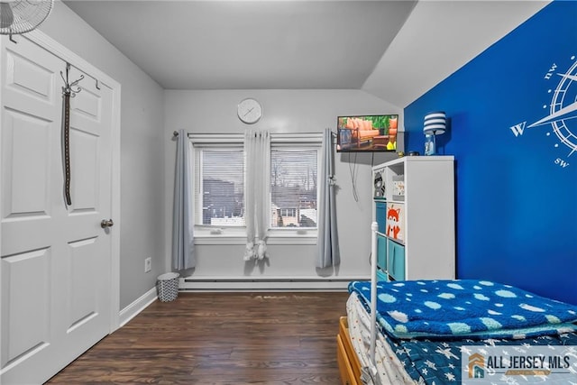 43 Livingston Ave, Avenel, NJ 07001 - bedroom featuring vaulted ceiling, wood finished floors, and a baseboard radiator