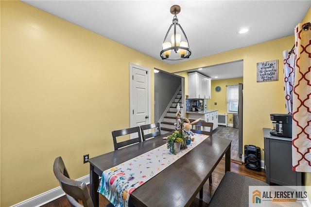 43 Livingston Ave, Avenel, NJ 07001 - dining space with recessed lighting, a chandelier, baseboards, stairway, and dark wood-style floors